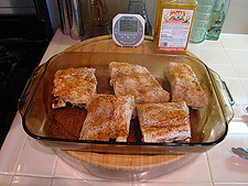 place ribs in baking dish & season