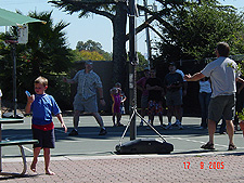 Jim shoots a basket.