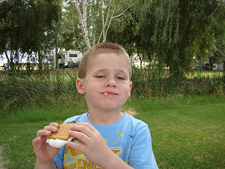 Hunter eating a S'more
