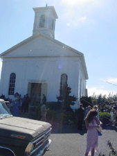 Heidi outside the church.