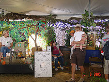 Dave shows Hunter the big Parrot.