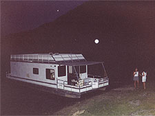 House boat docked.