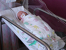 Hunter in his bassinet