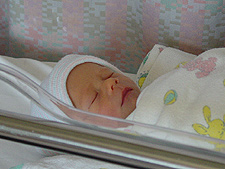 Hunter in his bassinet