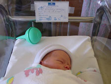 Hunter in his bassinet.