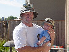 Helping daddy in the yard...
