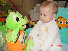 Hunter looks at Baby Tad.