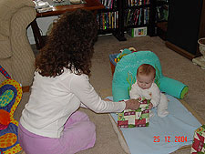 Mommy gifts Hunter another present to open.