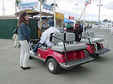 Heidi finding out what's goin' down from the golf cart people...