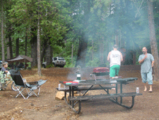 Dave and Ken play horseshoes.