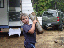 Tyler helps with the wood.