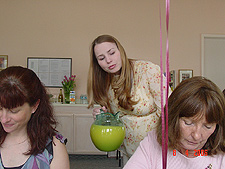 Jessica refilling the Mimosas.