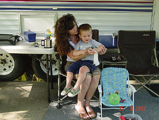 Heidi tends to Hunter's scraped knee.