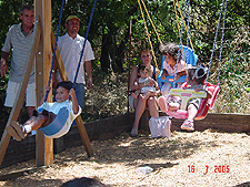 Kids swinging.