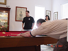 Mike, Pat and Dave playing pool.