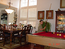 Tyler playing pool.