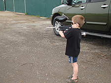 Hunter testing his paintball gun.