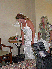 Getting into the dress.