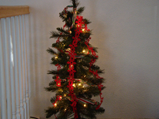 Adding ribbon and garland.