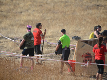On the way up the hill with his bucket.
