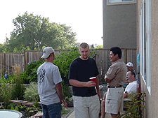 Peter, Nate, Abraham, Dean and Mike hang out by the keg.