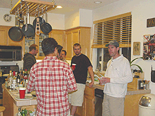Guys hanging out in the kitchen...