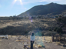 Heidi reads the gravestones.