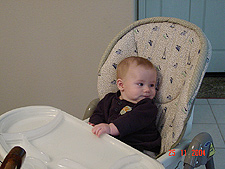 Hunter in the high chair.