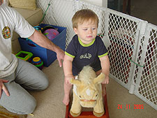 Hunter on his rocking horse.