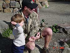 Hunter and Dave feeding ducks.