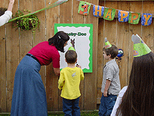 Sylvia checks Kyle's mark.