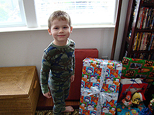 Hunter picks his present from Olivia & AJ.