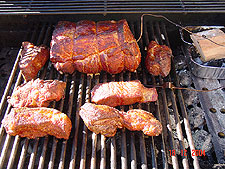 Bbqing pork roast and ribs.