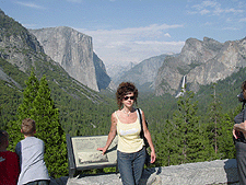 Heidi in front of a magnificant view of the valley.