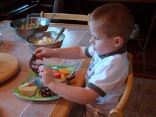 Hunter enjoying BBQ ribs