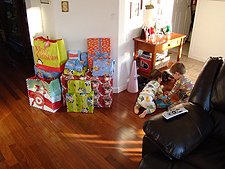 Hunter helps Ryder open a present.