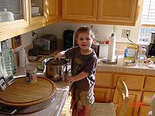 Hunter mixing the batter.