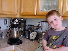 Hunter likes to watch the mixer.