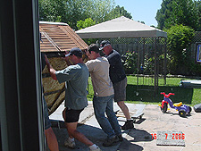 Moving the tub onto the furniture movers.