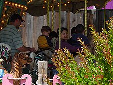 Dave and Hunter on the carousel