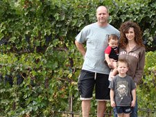 Us in front of a vineyard