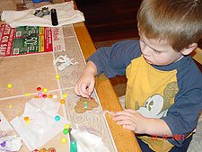 Hunter decorates a tree