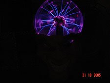 Mad scientist head in the dark.