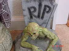 Zombie coming out of a grave