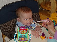 sticking out his tongue.