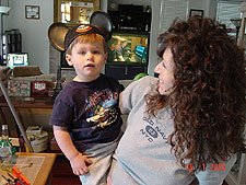 Hunter wearing daddy's old mouse ears.