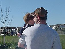 Hunter with a dandelion mommy gave him.