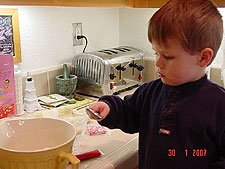 Hunter adding the oil