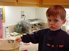 Hunter adding the oil