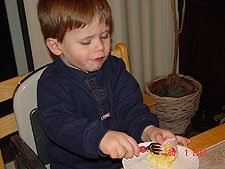 Hunter tests his cake